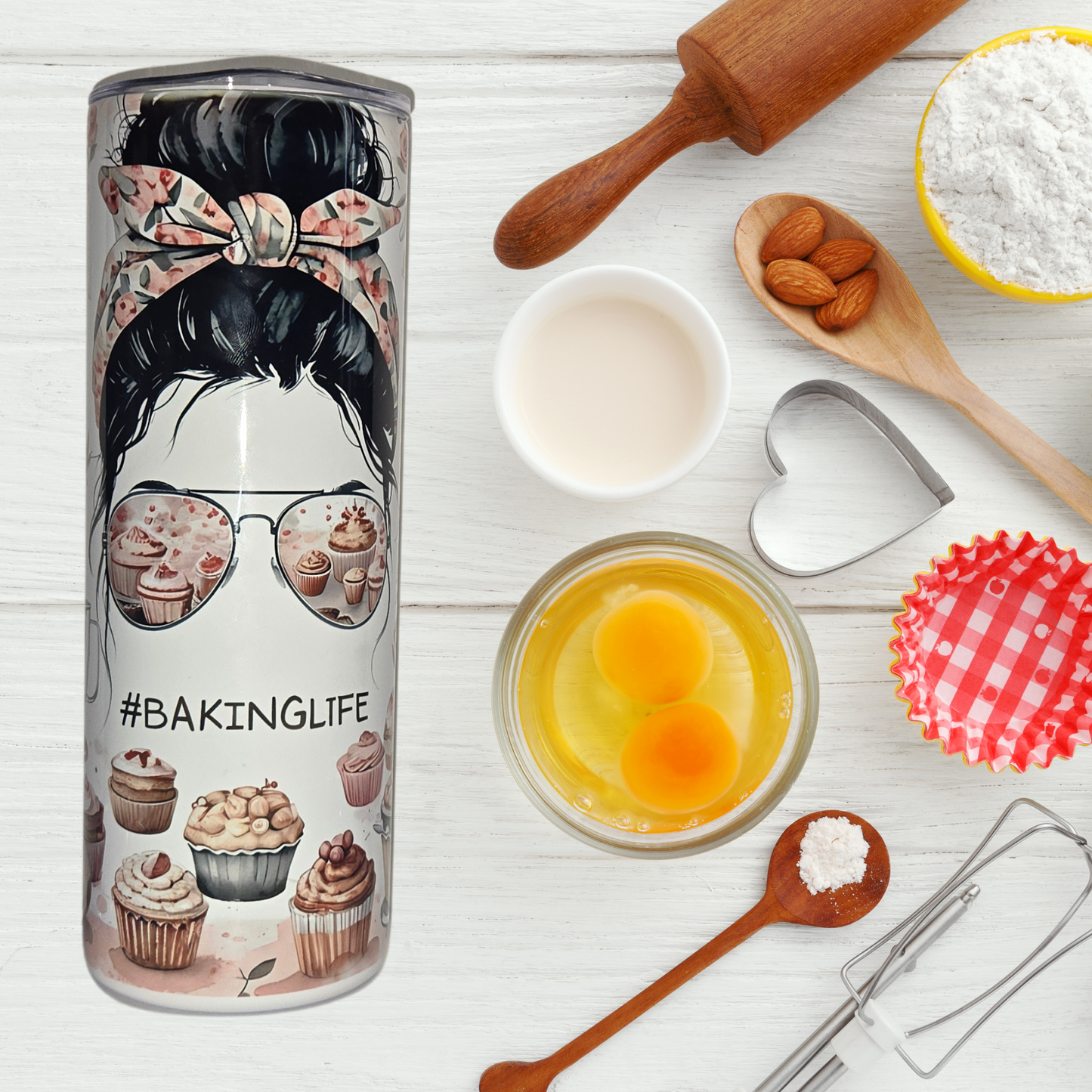 BakingLife 20 oz Stainless Steel Tumbler with messy bun, sunglasses reflecting cupcakes, and baking-themed design.