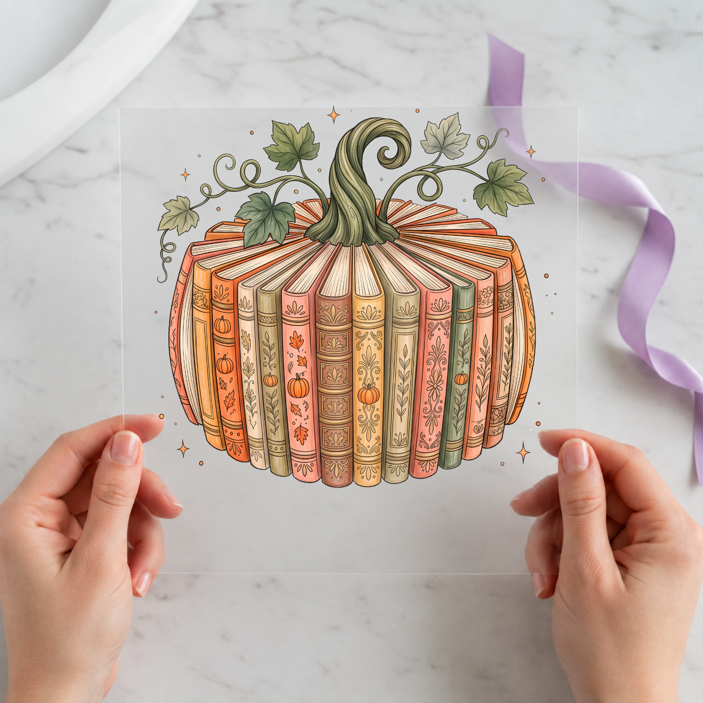Book Page Pumpkin featuring pumpkin built from vintage book spines and printed pages on a 12x12 ready-to-press DTF heat transfer
