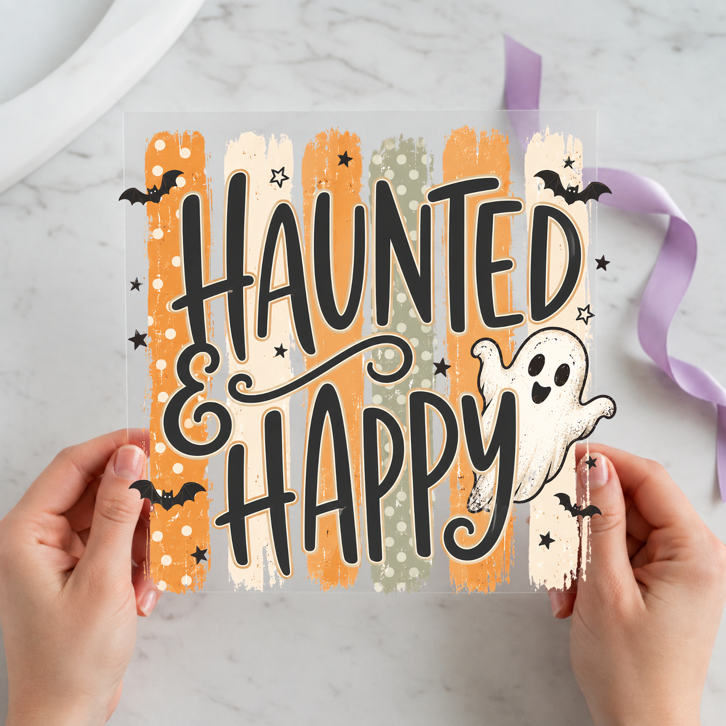 Haunted and Happy Ghosts featuring large Haunted and Happy lettering with two friendly ghosts on a 12x12 ready-to-press DTF heat transfer