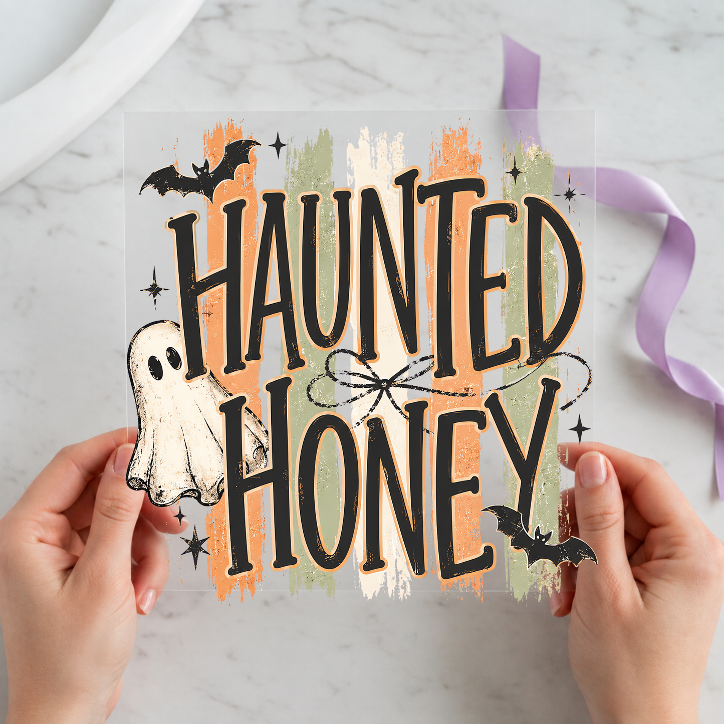 Haunted Honey Ghost featuring friendly ghost beside large Haunted Honey lettering and bats on a 12x12 ready-to-press DTF heat transfer