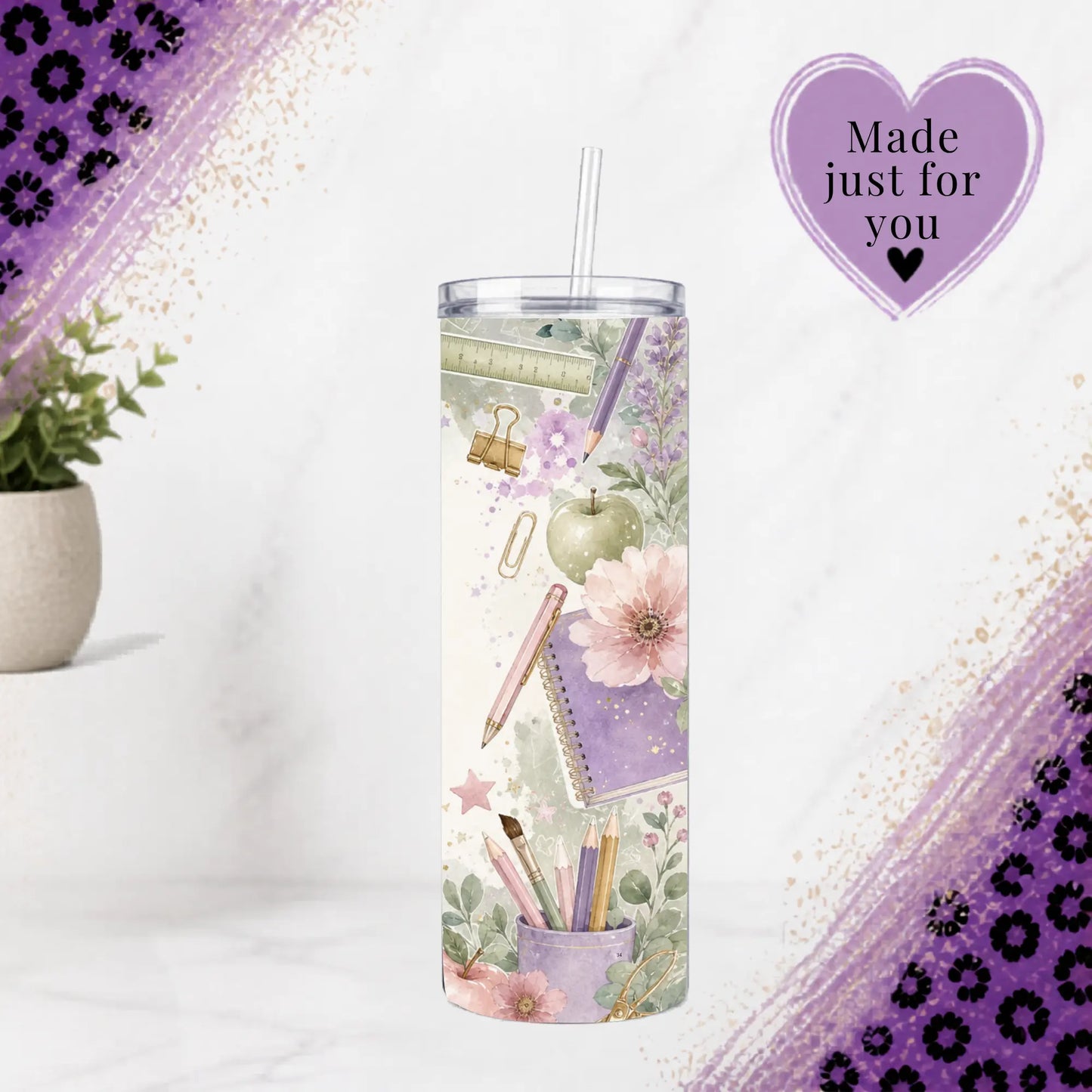 Back view of purple floral teacher tumbler with pencils, notebook, ruler and apple