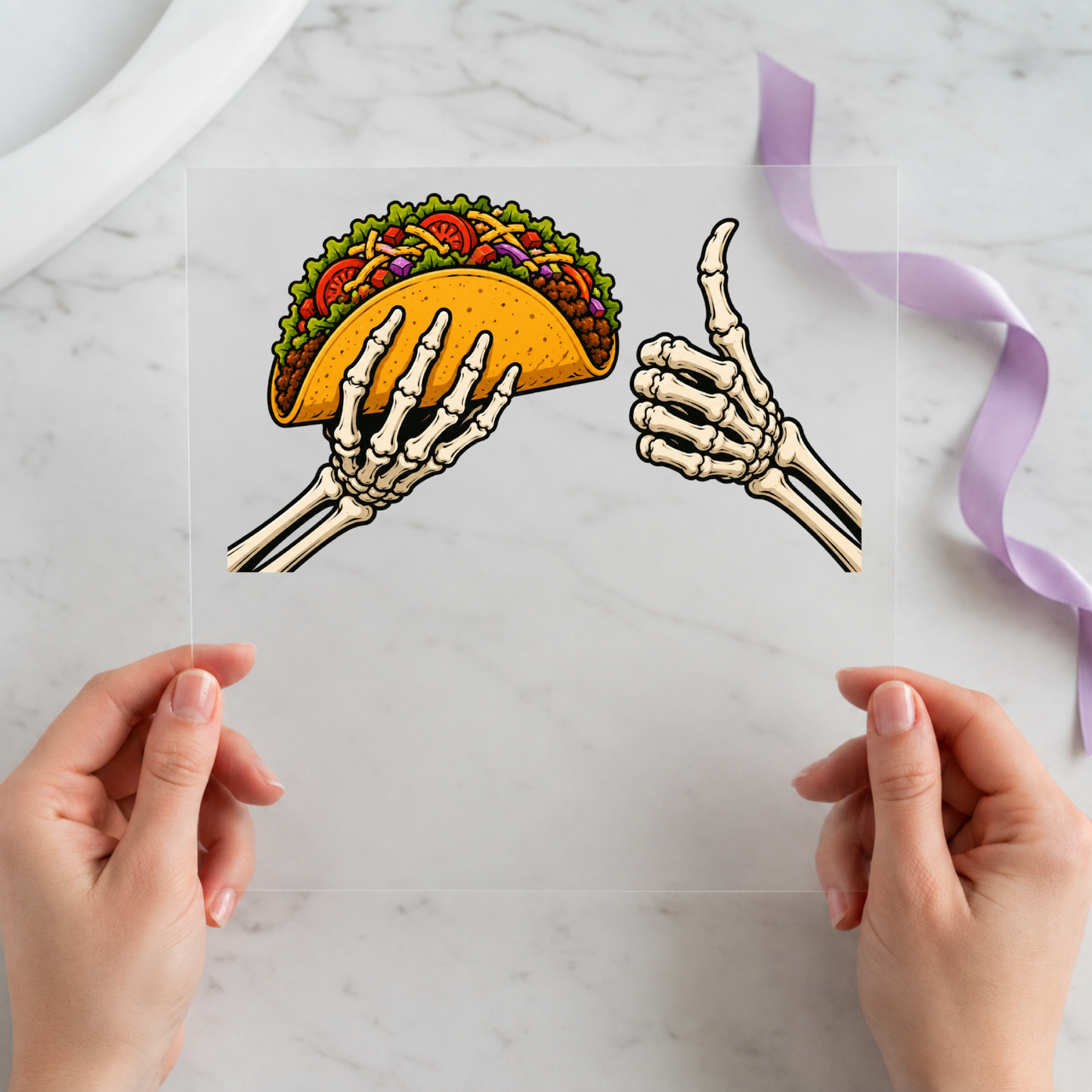 Skeleton Hands Holding a Taco featuring two skeleton hands presenting a colorful taco on a 12x12 ready-to-press DTF heat transfer