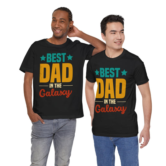 Two men wearing black "Best Dad in the Galaxy" Unisex Jersey Short Sleeve Tees smiling and posing.