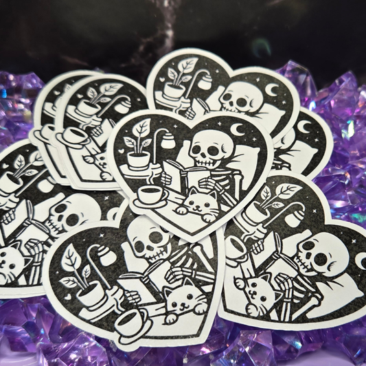 Cozy Skeleton Reading Sticker - Spooky Book Lover & Cat Friend Decal - Gothic Comfort Scene