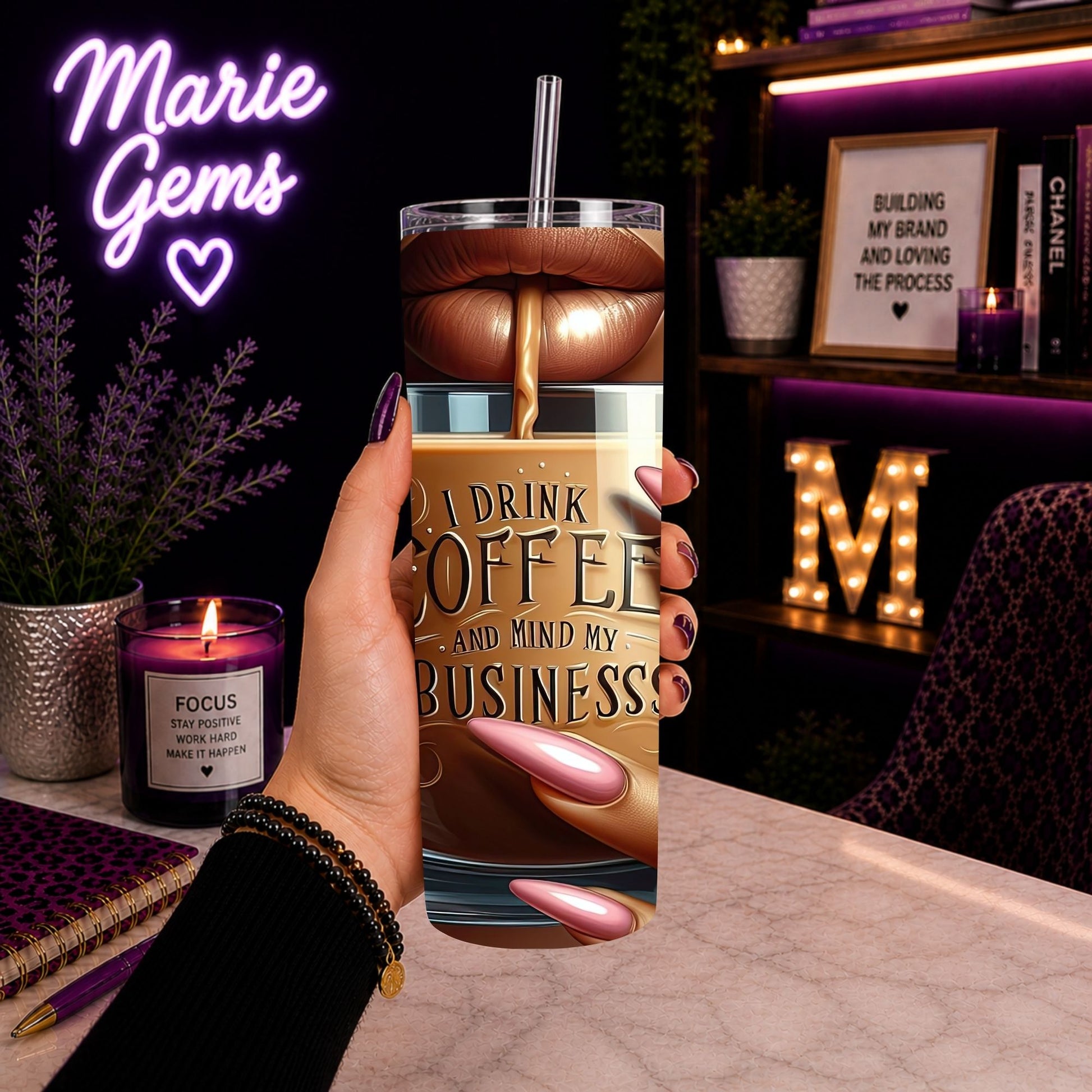Hand holding I Drink Coffee and Mind My Business 20oz Tumbler | Boss Babe Travel Mug in cozy purple-lit home office setting