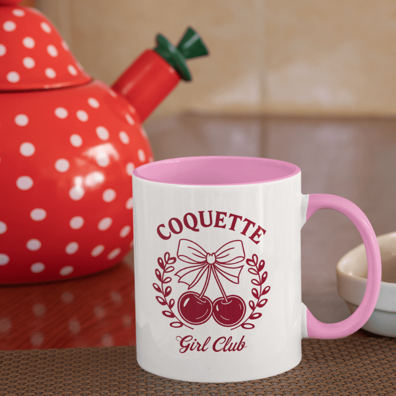 Aesthetic Cherry Coquette Coffee Mug with cherry bow design, pink handle, and Coquette Girl Club text.