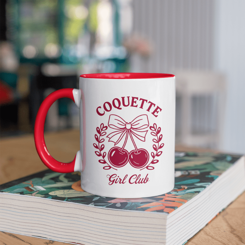 Aesthetic Cherry Coquette Coffee Mug with cherry bow design and Coquette Girl Club text on a white ceramic mug.
