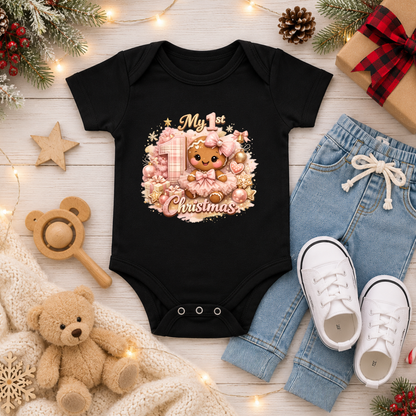 Baby Girl First Christmas Bodysuit Infant Bodysuit Outfit showing an adorable gingerbread girl surrounded by pink ornaments, gifts, festive accents, and "My 1st Christmas" artwork