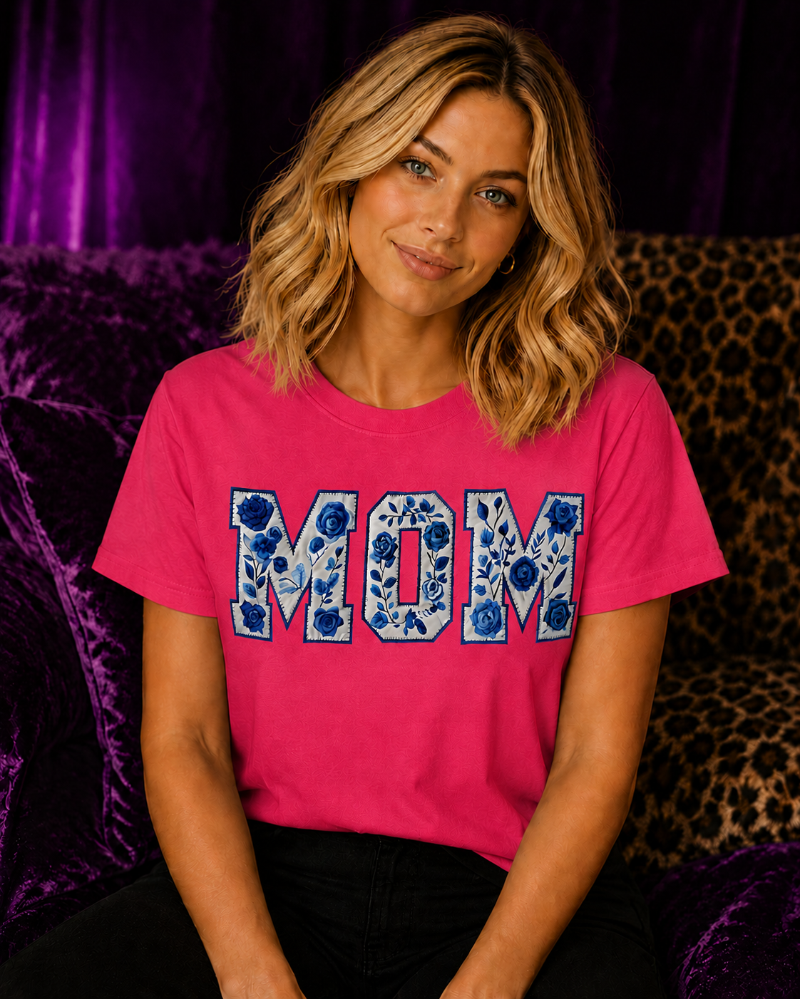 Blonde woman wearing a heliconia pink Gildan Blue Floral Mom T-Shirt with blue chinoiserie floral MOM graphic