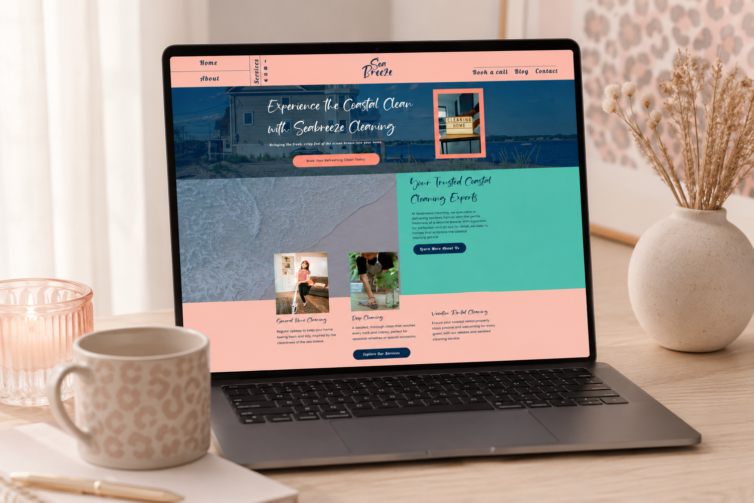 Coastal-inspired cleaning company website design displayed on a laptop featuring soft pink and teal branding for a service-based business.