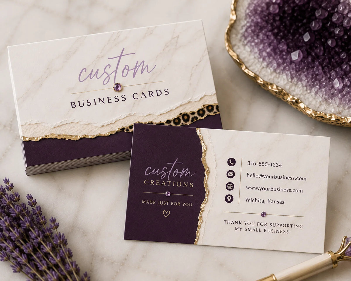 Custom marble and purple business cards with 'custom business cards' and contact info layout, styled with amethyst crystals and leopard print accents - Marie Gems