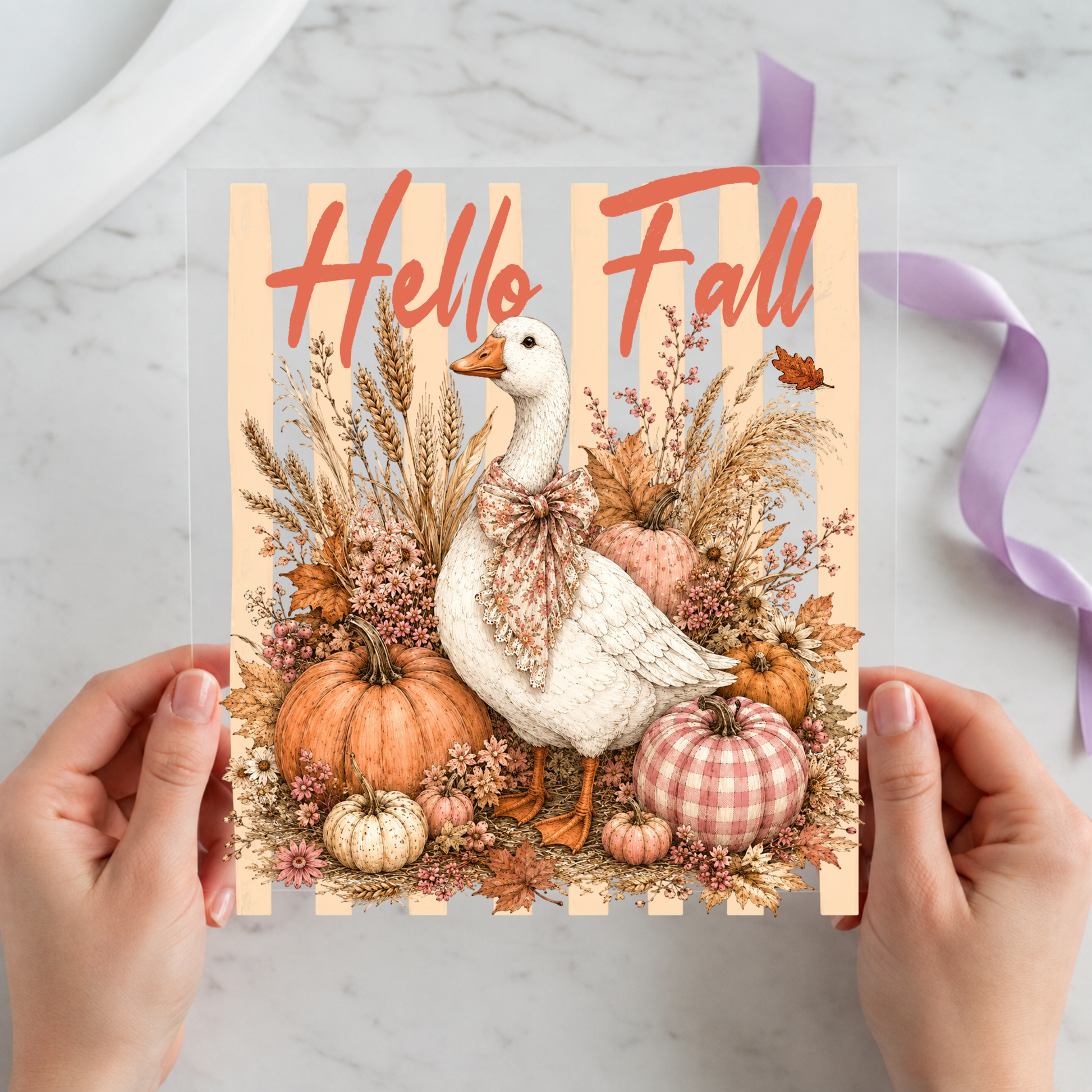 Hello Fall Goose featuring white goose in a textured sweater surrounded by wheat and pumpkins on a 12x12 ready-to-press DTF heat transfer