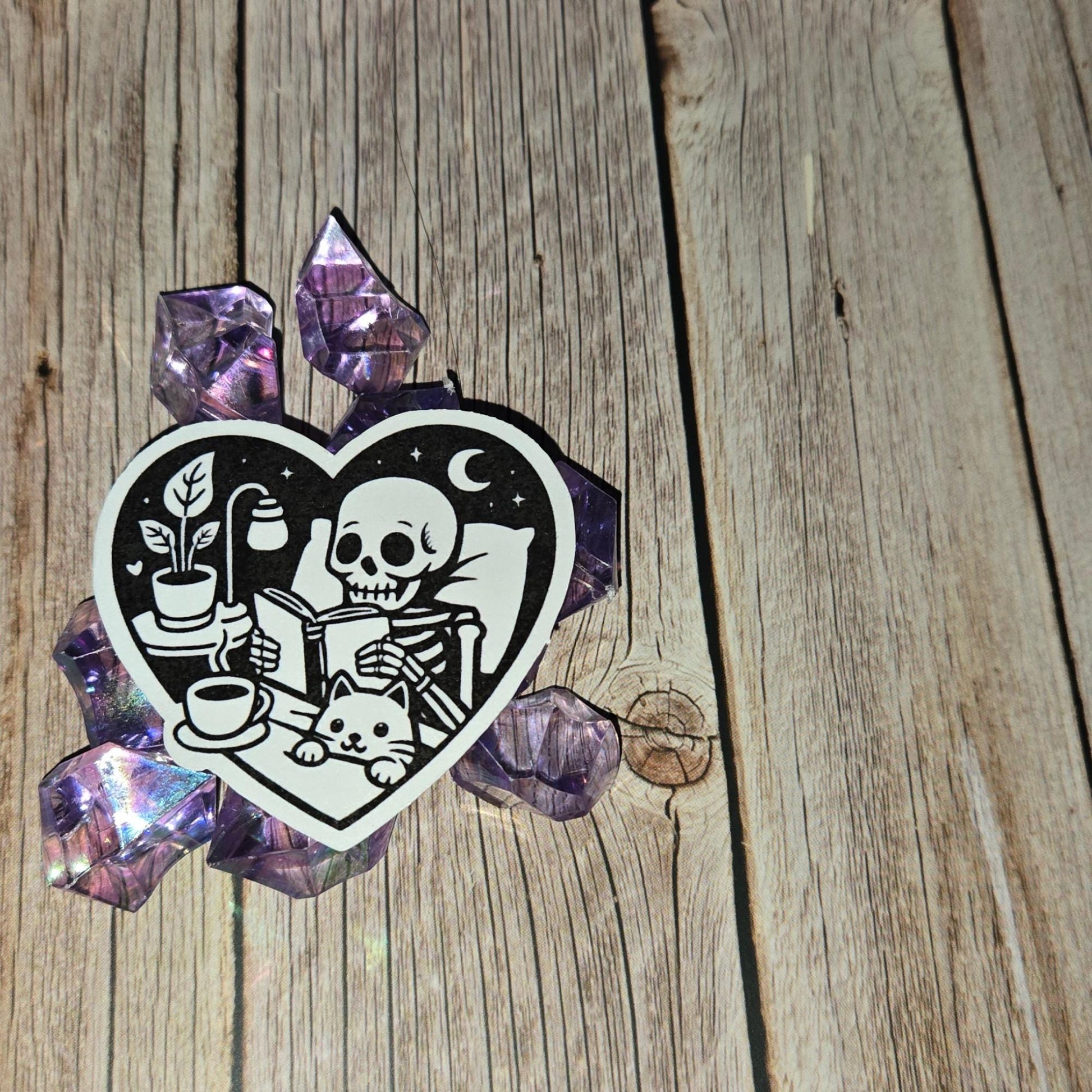 Cozy Skeleton Reading Sticker - Spooky Book Lover & Cat Friend Decal - Gothic Comfort Scene