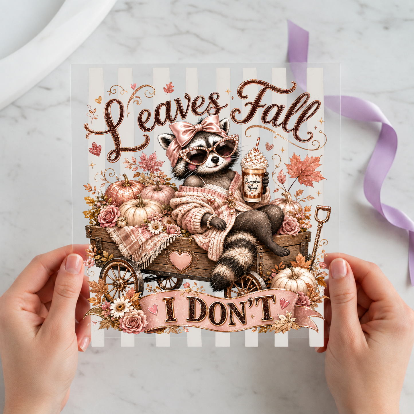 Jimothy the Raccoon Leaves Fall I Don't featuring Jimothy raccoon relaxing with iced coffee among pink pumpkins and fall leaves on a 12x12 ready-to-press DTF heat transfer