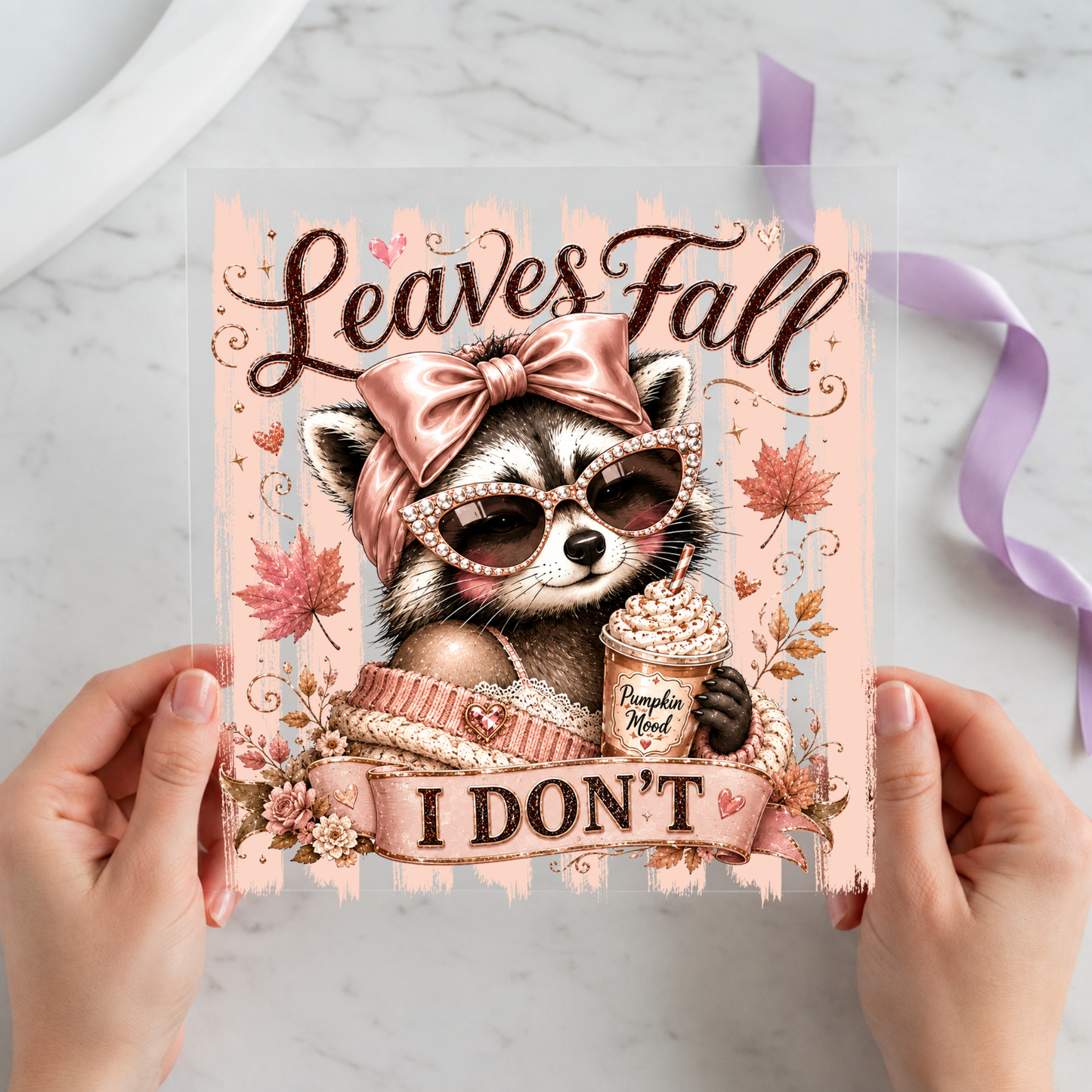 Leaves Fall I Don't Jimothy Raccoon featuring bow-wearing Jimothy raccoon holding iced coffee among pink fall leaves on a 12x12 ready-to-press DTF heat transfer
