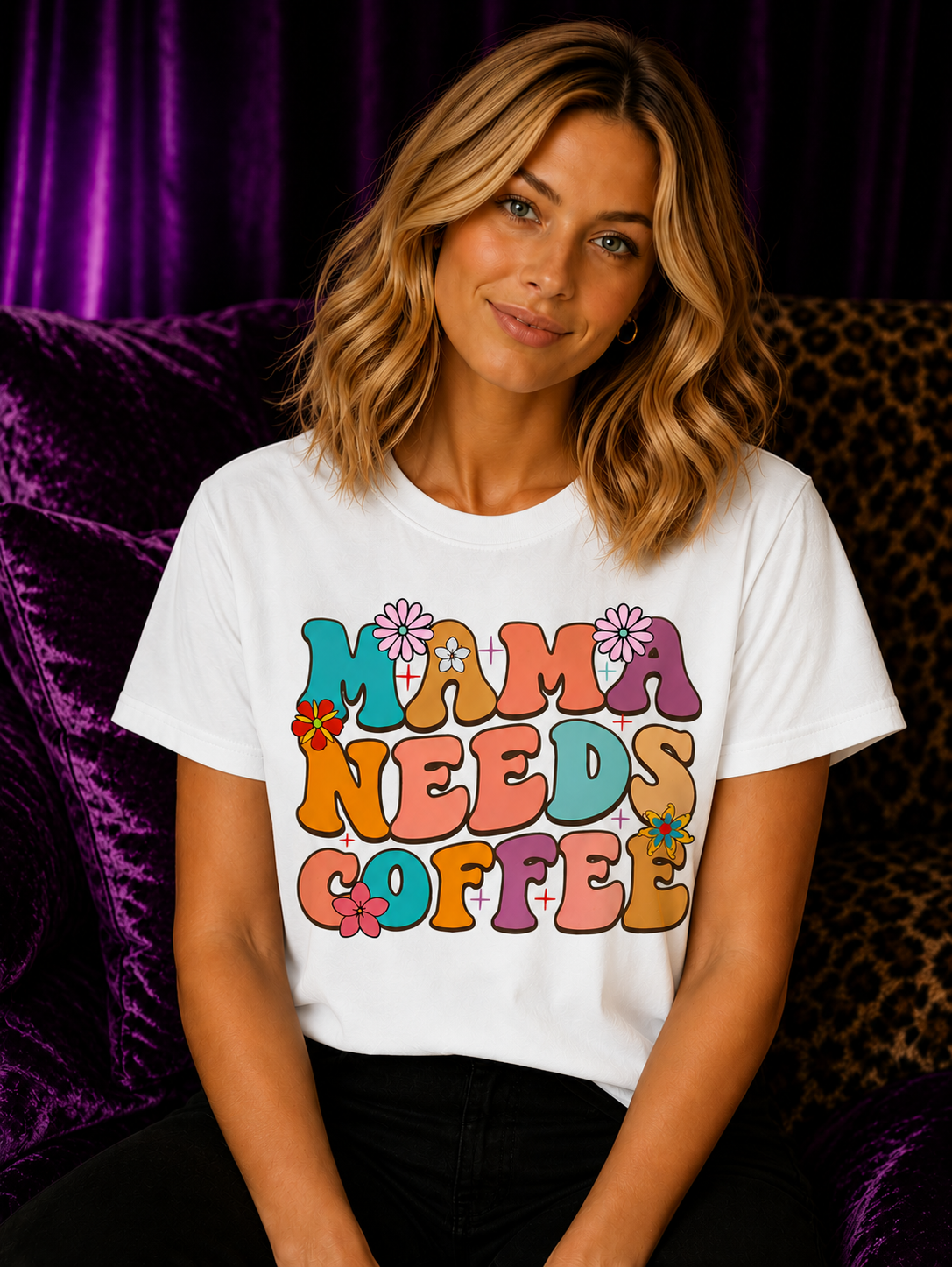 Blonde woman wearing a white Gildan Mama Needs Coffee T-Shirt featuring colorful retro groovy typography