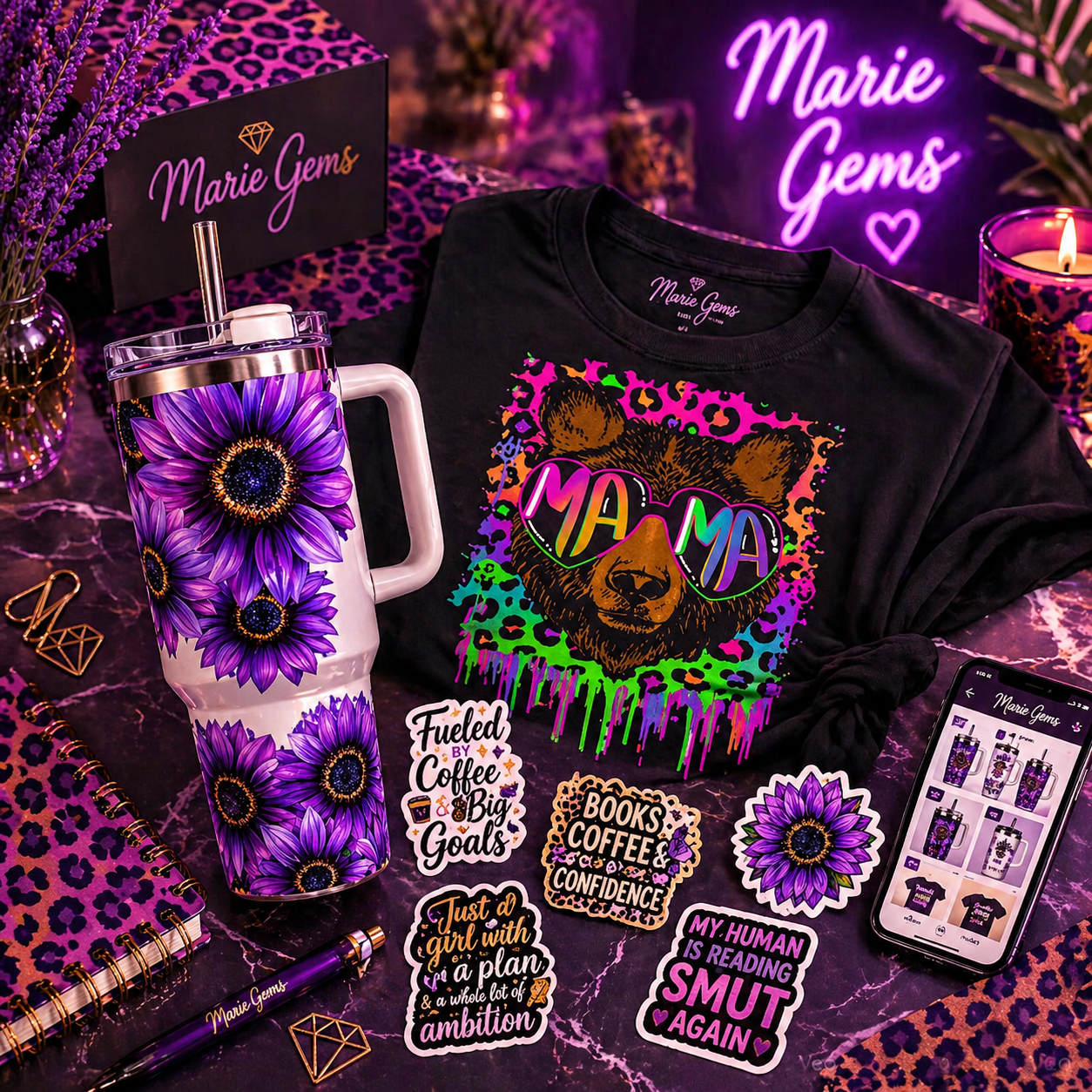 Marie Gems flatlay featuring custom sublimation tumbler, graphic mama t-shirt, waterproof stickers, and purple cheetah print aesthetic for handmade gifts and small business branding inspiration
