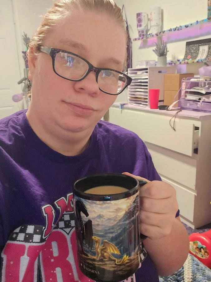 Marie Gems founder in her Wichita, Kansas home office enjoying coffee while helping small business owners with branding, website design, and Pinterest marketing.