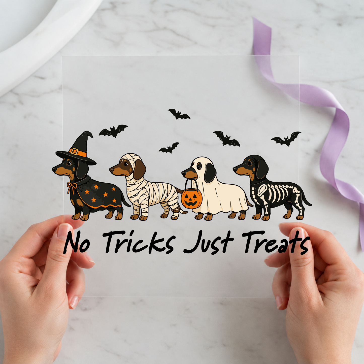 No Tricks Just Treats Halloween Dachshunds featuring five dachshunds dressed as witch, mummy and skeleton beneath flying bats on a 12x12 ready-to-press DTF heat transfer