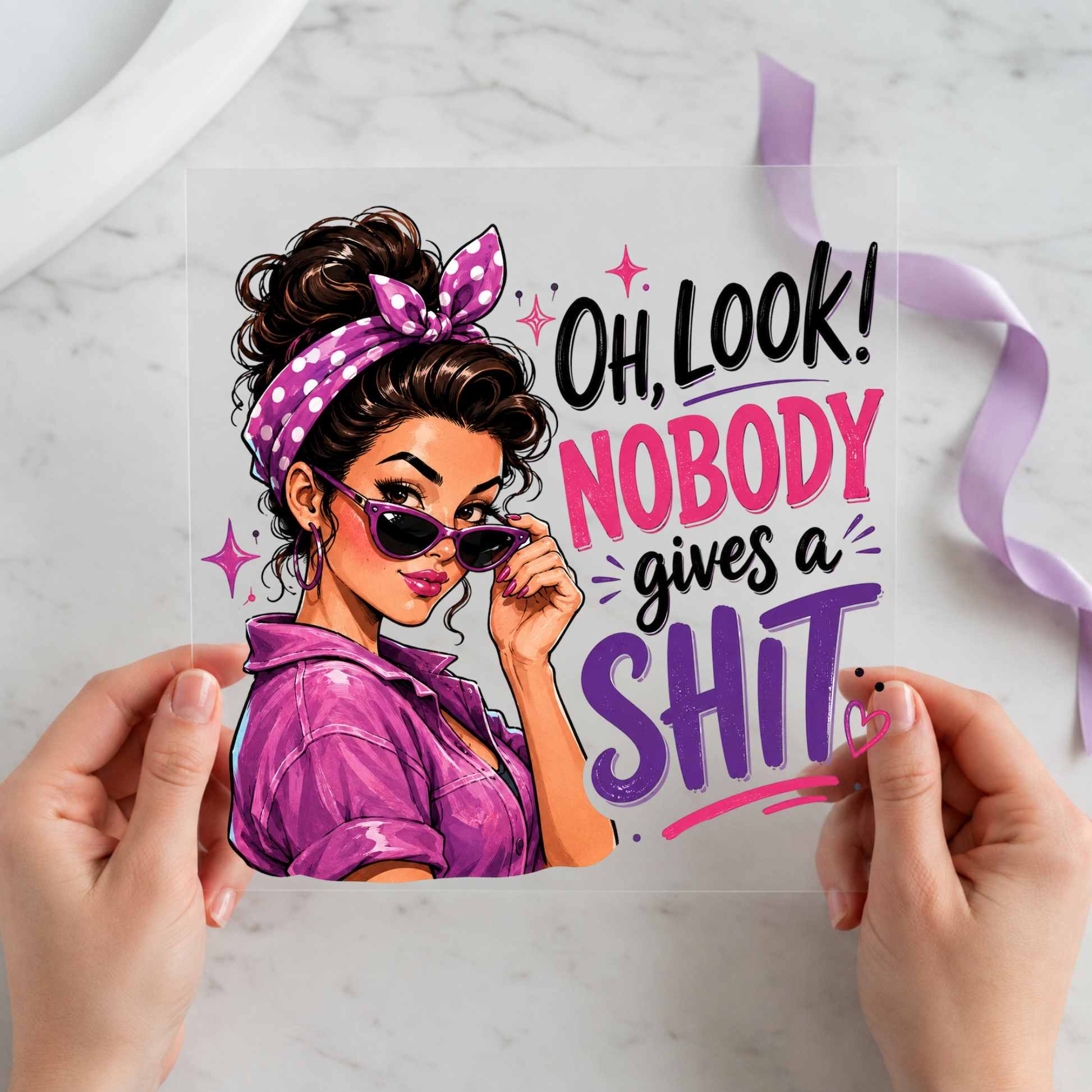 Oh Look Nobody Gives a Shit featuring retro woman in sunglasses beside purple and pink explicit lettering on a 12x12 ready-to-press DTF heat transfer
