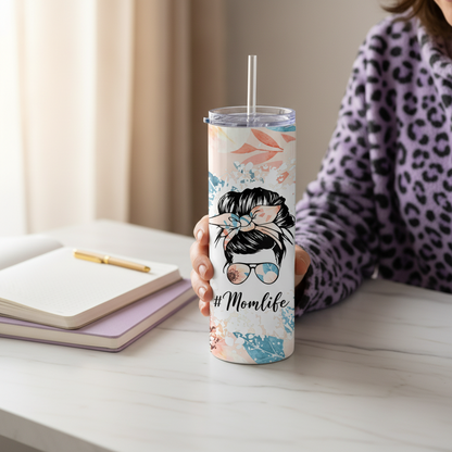 Momlife Made-to-Order 20 oz Stainless Steel Tumbler showing a sweet messy bun floral design in soft peach tones, this tumbler blends cozy style with everyday function