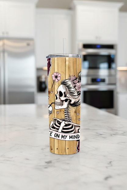 Skeleton Coffee Tumbler with Pink 20 oz Stainless Steel Tumbler showing skeleton coffee tumbler with pink glitter roses artwork with insulated stainless steel tumbler, alternative
