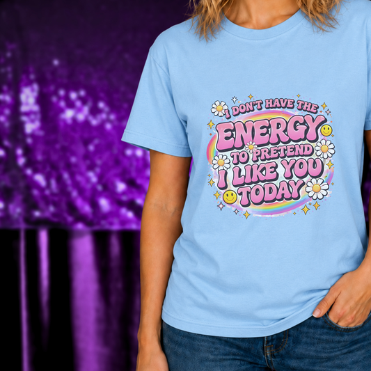 Funny Introvert Shirt | I Don't Have Energy | Marie Gems with colorful retro text, smiley faces, and daisy accents on light blue fabric