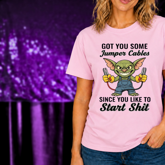 Got You Some Jumper Cables T-Shirt Funny Gremlin Graphic Tee with green gremlin holding jumper cables on pink shirt