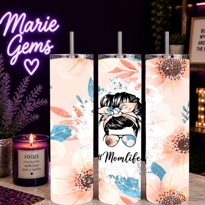 Momlife Made-to-Order 20 oz Stainless Steel Tumbler showing a sweet messy bun floral design in soft peach tones, this tumbler blends cozy style with everyday function, product