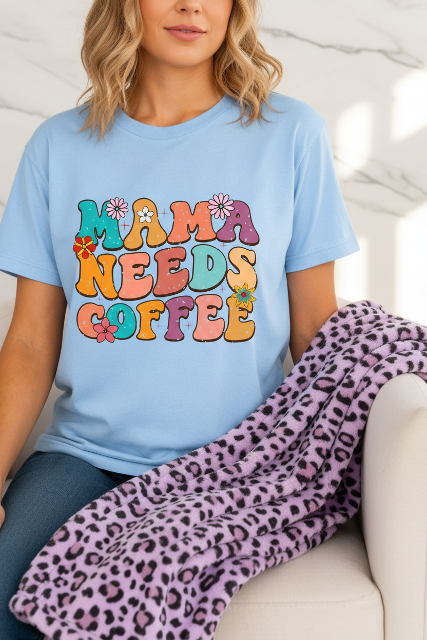 Mama Needs Coffee T-Shirt | Retro Groovy Mom Tee | Funny Coffee Shirt with colorful flower text on blue shirt