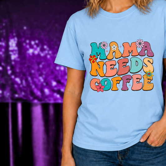Mama Needs Coffee T-Shirt | Retro Groovy Mom Tee | Funny Coffee Shirt with colorful flower text on blue shirt