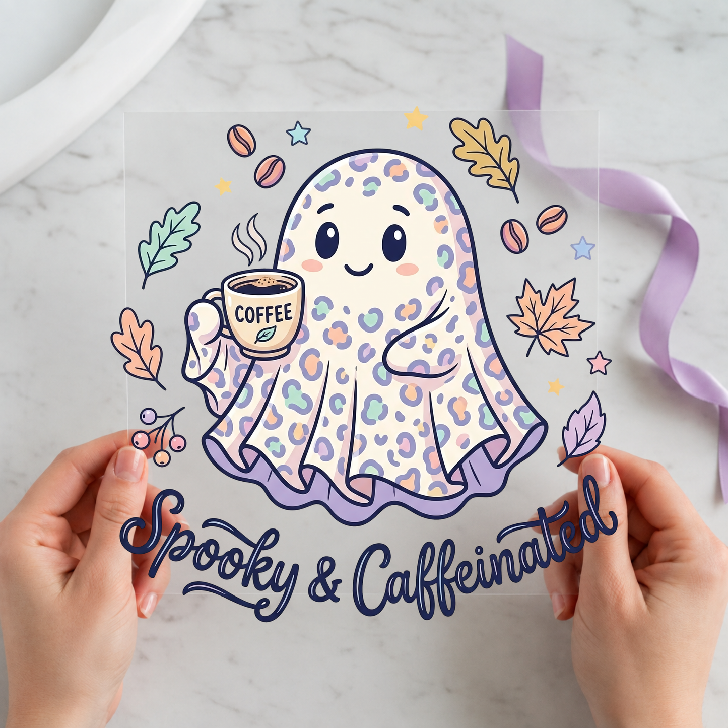 Spooky and Caffeinated Ghost featuring pastel patterned ghost holding coffee among autumn leaves on a 12x12 ready-to-press DTF heat transfer