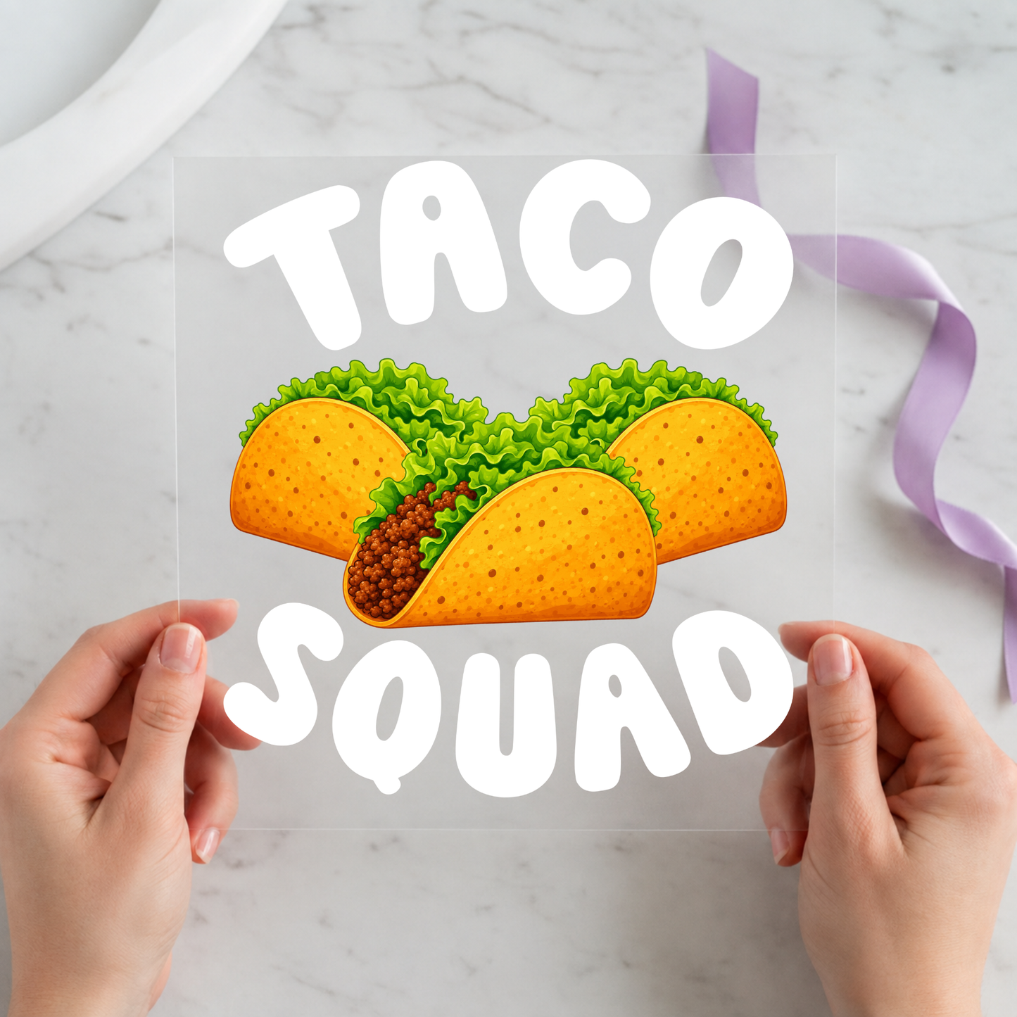 Taco Squad featuring three colorful tacos beneath bold white Taco Squad lettering on a 12x12 ready-to-press DTF heat transfer