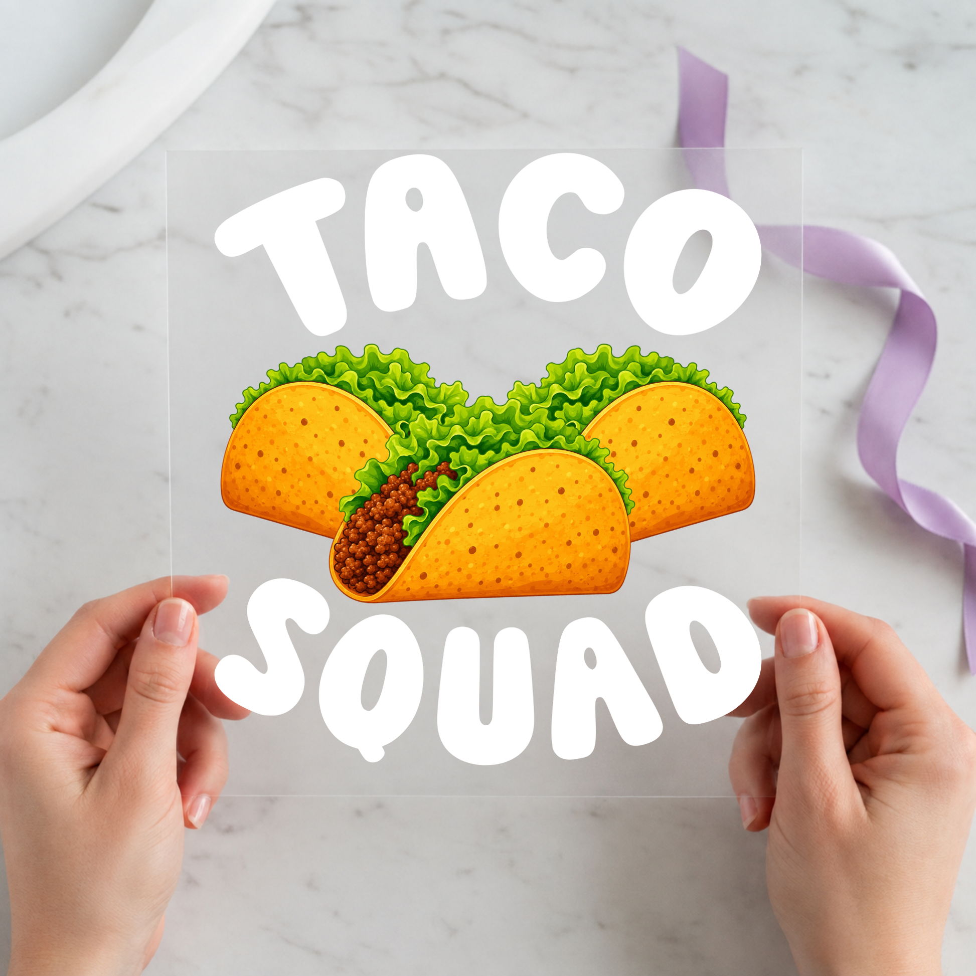 Taco Squad featuring three colorful tacos beneath bold white Taco Squad lettering on a 12x12 ready-to-press DTF heat transfer