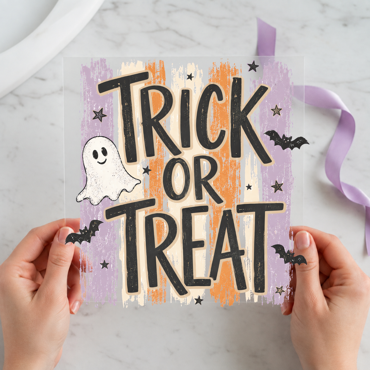 Trick or Treat Lavender Ghost featuring large Trick or Treat lettering with a friendly ghost and bats on a 12x12 ready-to-press DTF heat transfer